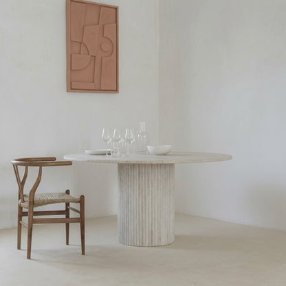 Table à manger ronde en travertin Thèbes Modernista Maroc